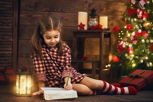 girl-writes-the-letter-to-santa-PD3RSHC.